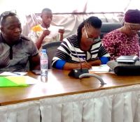 ms izatta nagbe of lgsa and ms gmasonah aboah taking notes during the land rights act messaging workshop held in monrovia